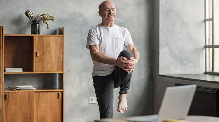 OIder man performing physical exercise which helps pump oxygenated blood to his brain