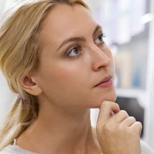 Woman looking at her computer screen