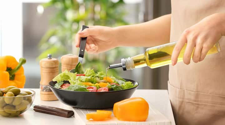 Salad in a bowl made with black seed oil