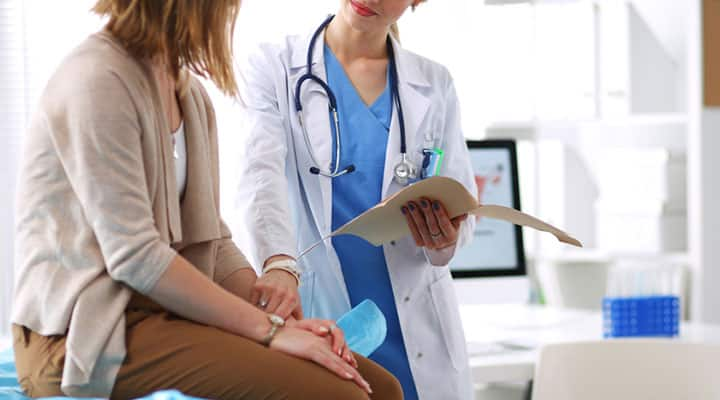 Woman speaking with her doctor about the benefits of ashwagandha