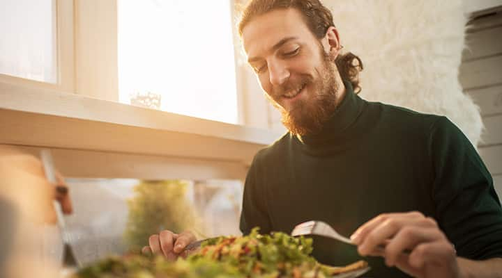 Man eating a vegetarian diet that is missing nutrients like protein and amino acids