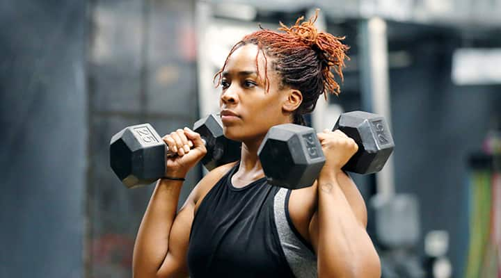 Woman doing upper body strength training